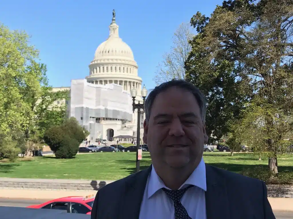 Photo of Mr. Ludwik Kozlowski outside the United States Capitol in Washington DC during the Disability Policy Seminar 2019.